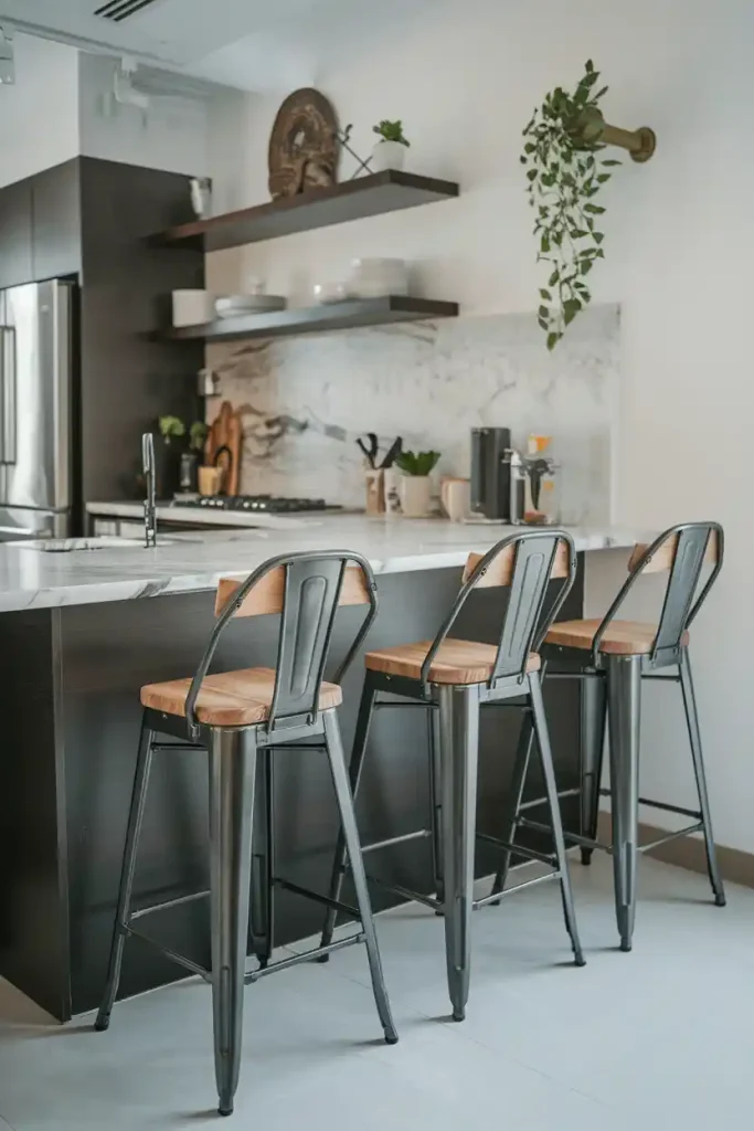 A sleek, modern kitchen with industrial-style metal stools featuring wood accents, illustrating how these stools match the decor.