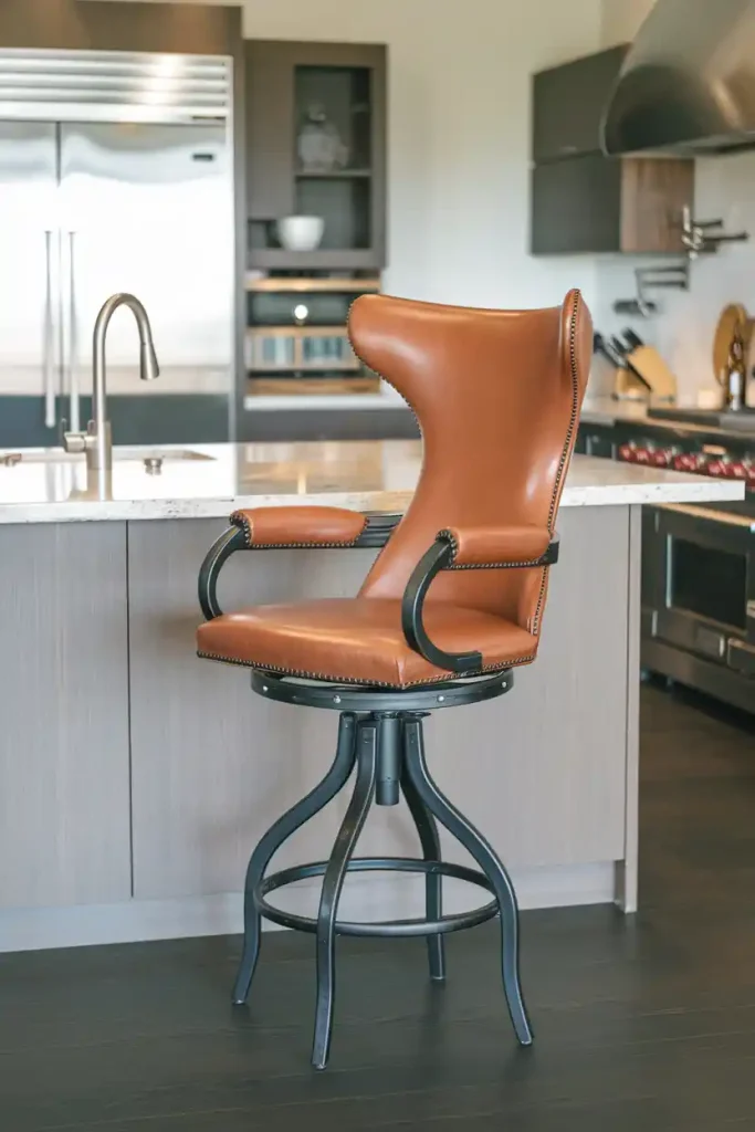 Swivel Bar Stool: Depict a stylish swivel bar stool with a high back and leather upholstery, situated at a contemporary kitchen island.