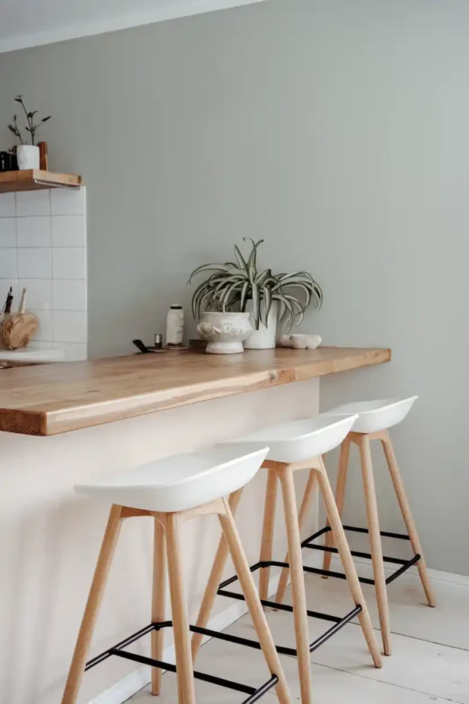 white bar stools with natural wood legs