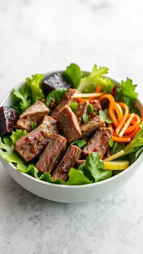 A bowl of Korean beef salad with marinated beef, fresh greens, and colorful vegetables.