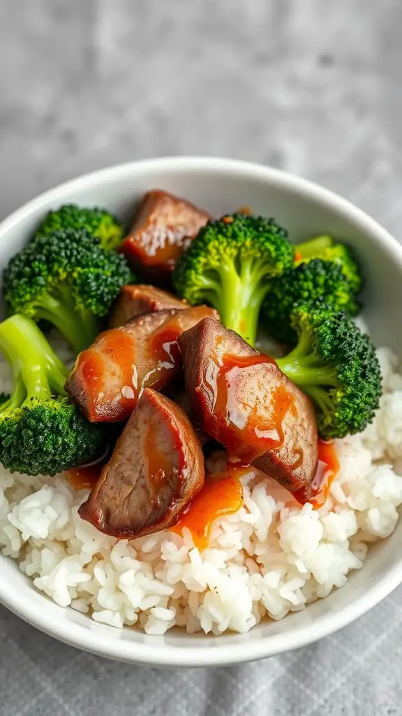 A bowl of Teriyaki Beef and Broccoli served over white rice.