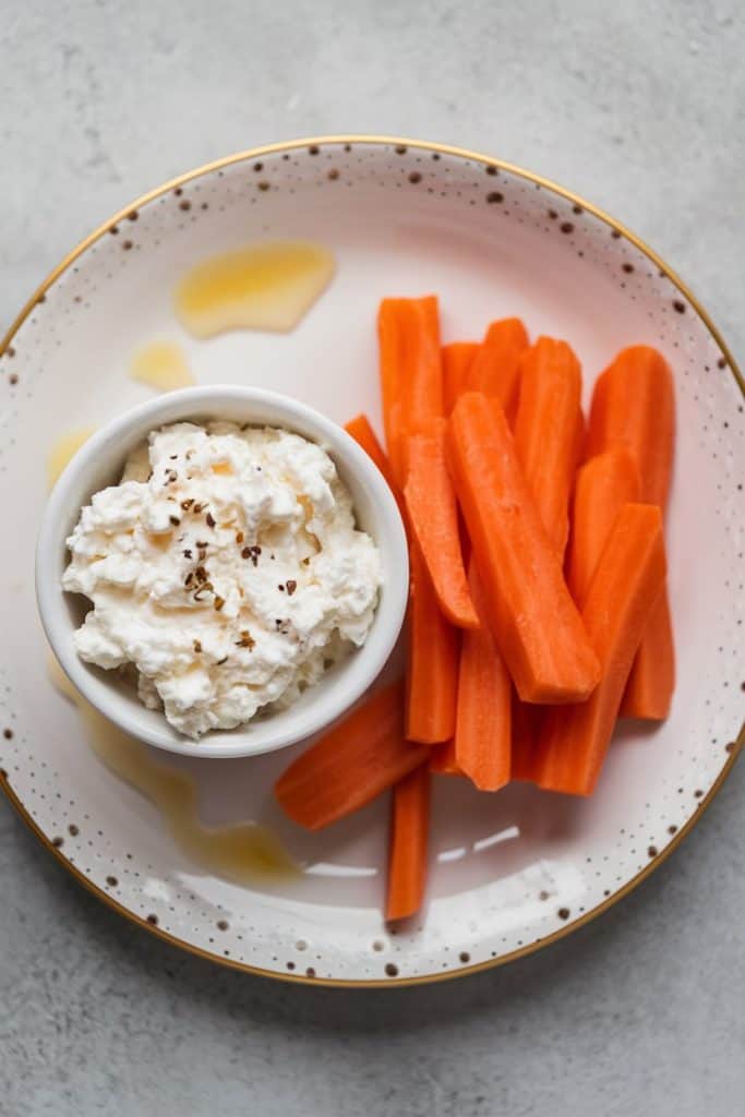 Low-Calorie Cottage Cheese and Carrot Sticks Snack Plate