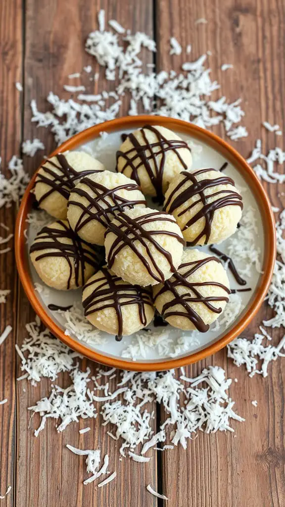 A plate of chocolate-coated coconut macaroons drizzled with chocolate on a wooden table.