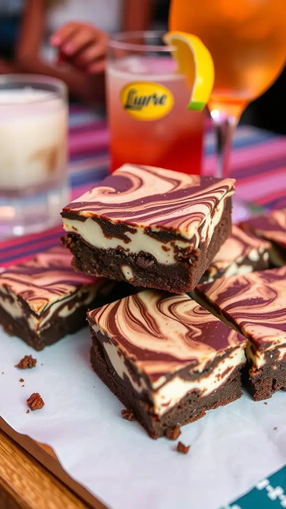 Delicious cream cheese swirl brownies on a plate, with drinks in the background