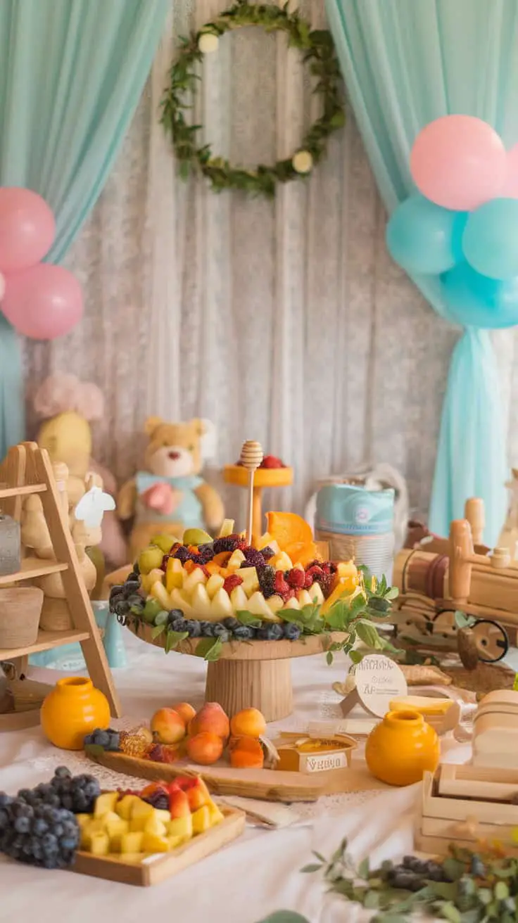 A colorful fruit platter arranged with a variety of fresh fruits, honey dip, and playful decorations in a pastel themed setting.